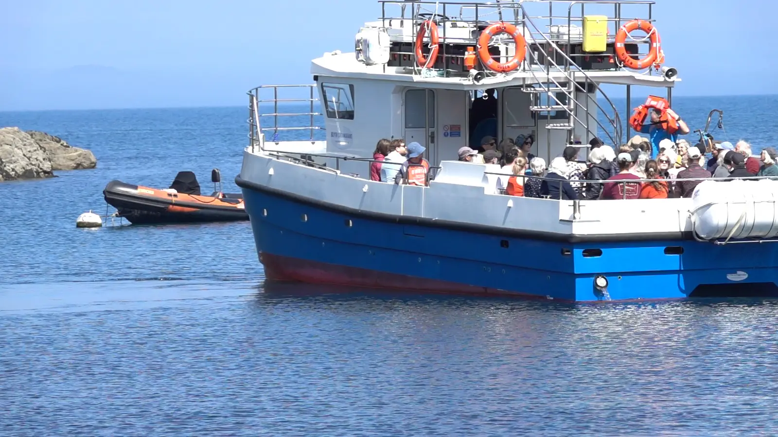 Passengers aboard a New Zealand tour boat